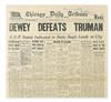 TRUMAN, HARRY S. Chicago Daily Tribune, with the headline DEWEY DEFEATS TRUMAN, Signed and Inscribed on the first page:
